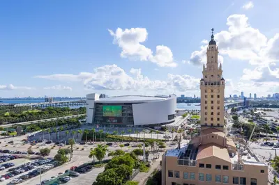 a view of a city with a clock tower at 2409 Apt in Downtown Miami with Gym and in front of Kaseya Center in Miami
