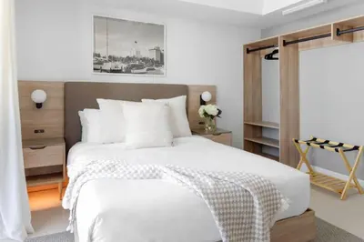 a bedroom with a large white bed and a window at 3002 Downtown Miami apt in front of Kaseya Center with Gym and Pool in Miami
