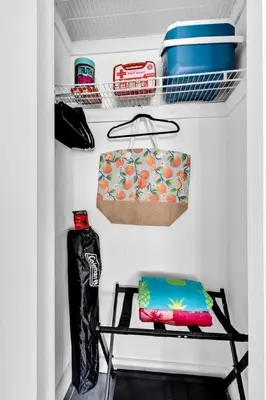 a walk in pantry with two chairs and a shelf at Unit 2 Cute Studio in North Miami 10min to beach in Miami