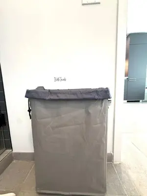 a gray trash can sitting in a room at Stunning City Views Studio Gym Pool in Miami