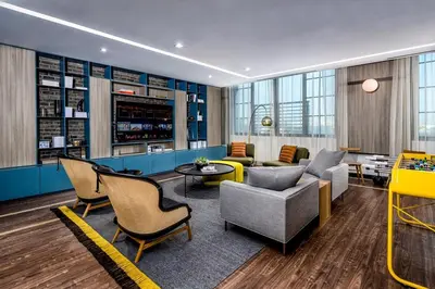 a lobby with chairs and a couch and a table at The Juliet VII Vibe 8702 in Miami