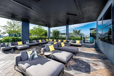 a lounge with couches and chairs in a building at The Juliet VII Vibe 8702 in Miami