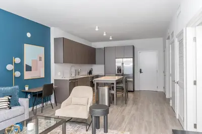 a kitchen and living room with a couch and a table at The Juliet VII Vibe 8702 in Miami