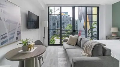 a living room with a couch and a table at The Juliet X Vibe 8741 in Miami