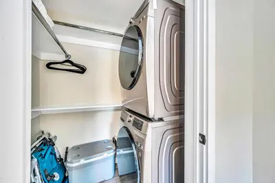 a washer and dryer in a laundry room at Waterfront Heated pool Lime Key Two in Fort Lauderdale