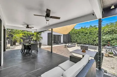 a living room with a couch and a table at Family Vacation Home in Miami