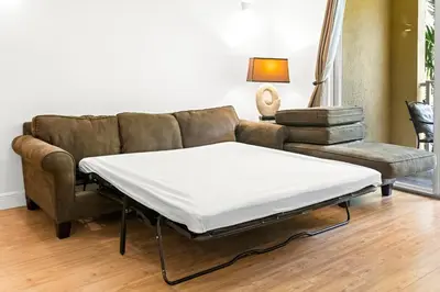 a couch and a table in a living room at Yacht Club Miami Suite 1BR and 1BA with Pool FREE Parking Gym & Jacuzzi in South Island
