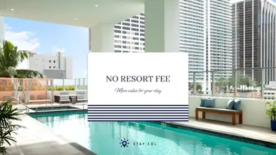 a sign next to a swimming pool in a building at Beautiful 2BR Apartment with gym and Pool in Miami