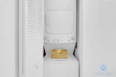 a white refrigerator with a box of food in it at Amazing 1BR Apt View & Balcony - Pool & Gym in Hallandale Beach