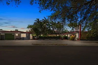a row of houses with lights on a street at 1BR Pet-Friendly Studio Parking & Backyard BBQ in Hollywood