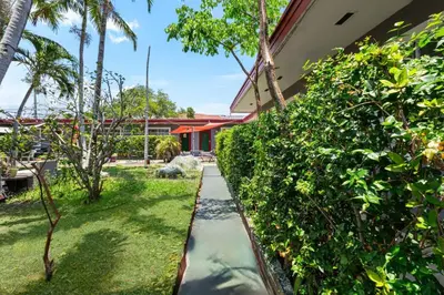 a garden path leading to a house at Hollywood 1BR Studio: Pets Allowed, BBQ & Parking in Hollywood