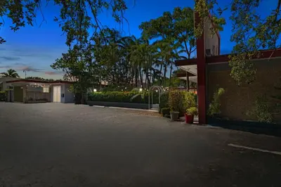 a parking lot in front of a building at Relaxing 1BR w/ BBQ, Patio & Convenient Access in Hollywood