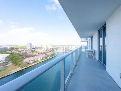 a balcony with a view of the water at 3 BDR Beach Bliss in Hollywood