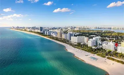 an aerial view of a beach and the ocean at Contemporary chic, next to the beach - 1 Bedroom in Miami Beach