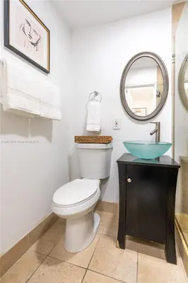 a bathroom with a toilet and a sink at Contemporary chic, next to the beach - 1 Bedroom in Miami Beach