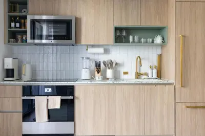 a kitchen with a stove and a microwave at Downtown Miami 2BR-2BA Panoramic City Views in Miami