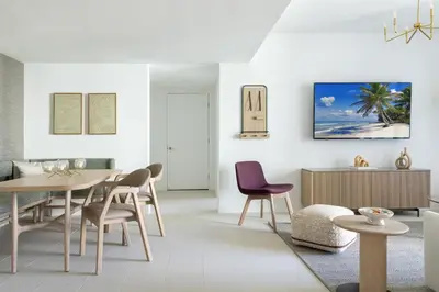 a white living room with a table and chairs at Downtown Miami 2BR-2BA Panoramic City Views in Miami