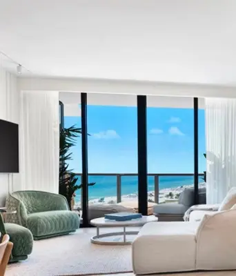 a living room with a view of the beach at W South Beach 1B Residence Ocean View in Miami Beach