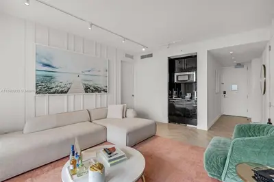 a living room with a couch and a table at W South Beach 1B Residence Ocean View in Miami Beach