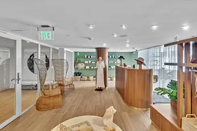 a room with a store with chairs and a dress on display at Brand New Mondrian - Miami Beach Waterfront Condo in Miami Beach