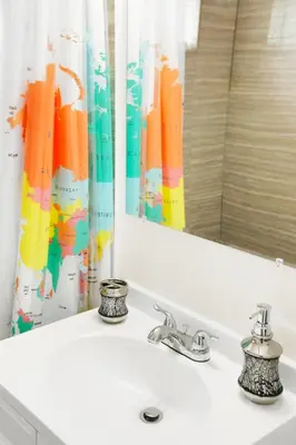 a bathroom with a sink and a mirror at Mimo 10 - Kitchen - Walkable - Fast WiFi - Free Parking in Miami