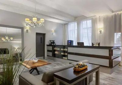 a living room with a couch and a table at South Beach South of Fifth 1 Bedroom Apartment Steps to Beach Sleeps 5 Pet Friendly in Miami Beach