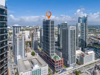 an overhead view of a city with a marker on top of buildings at Sunlit 1BR Condo In Downtown Miami in Miami