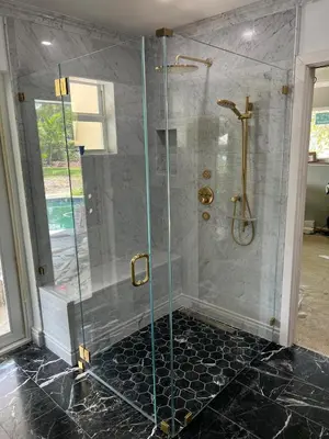 a shower stall with a glass door in a bathroom at Chic-ness Oasis NOW HEATED POOL ! in Cutler Bay