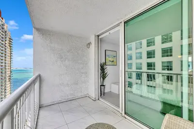 a balcony with a view of the water at Central Unit in Heart of Brickell in Miami