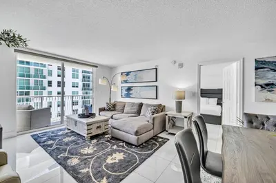 a living room with a couch and a table at Spacious 1 Bed 1 BTH Brickell Ocean View in Miami
