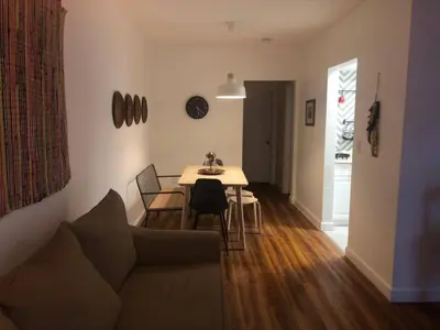 a living room with a couch and a table at 2 Bedroom Apartment Free Reserved Parking in Miami