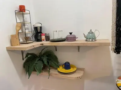 a shelf on a wall with some items on it at Tropical Paradise in Miracle Mile with Parking in Miami