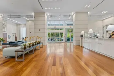 a lobby of a store with a table and chairs at Private Residences at Hotel Arya by SoFLA Vacations in Miami