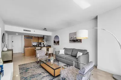 a living room with a couch and a table at Brickell Nights, Icon Lights 1BR Luxe Stay in Miami
