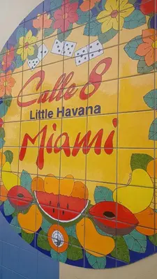 a sign that says little hawaiianmite on a tile wall at The Art House Little Havana in Miami