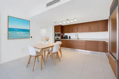 a kitchen with a table and chairs in a room at Luxury Unit 1 Bed W Residences Brickell in Miami