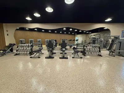 a gym with rows of chairs and tread machines at Shine Suites Balcony Duplex 5 in Miami Beach