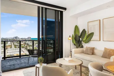 a living room with a couch and a table at Luxury Escape At 72 Park in Miami Beach