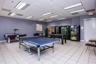 a room with a ping pong table in it at Lovely 2BR Rental in the Heart of Brickell in Miami