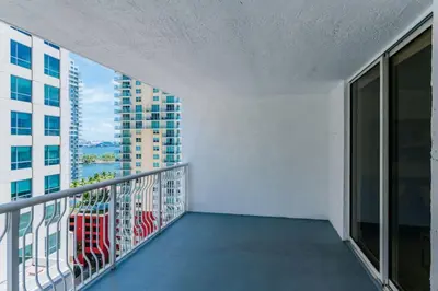 an empty balcony with a view of a building at Amazing 2BR at Brickell Free Parking in Miami