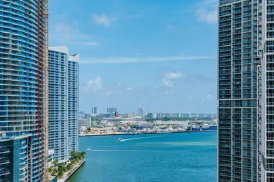 a view of a river between two tall buildings at Exclusive, Amazing, Bright and Spacious at Brickell in Miami