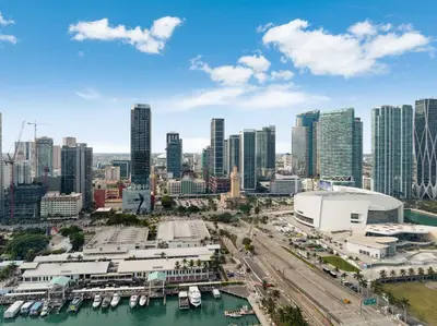 a city skyline with tall buildings and a harbor at Bellini Breeze - Cozy Central Miami Pool and Gym in Miami