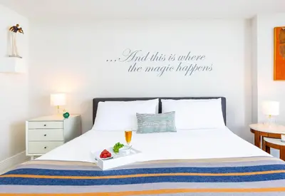 a bedroom with a bed with the words and this is where the magic happens at MVR-Corner Unit w Epic Views in Miami