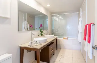 a bathroom with a sink and a shower at MVR - Stylish Stay w Resort Access in Miami