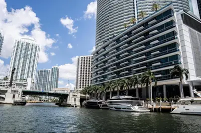 a large building with boats in the water in a city at MVR - Stylish Escape in Icon Brickell in Miami