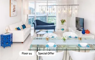 a living room with a couch and a table at MVR Luxury Condo High Floor European Design in Miami