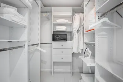 a white walk in closet with a radio in it at MVR - Sky-High Style in Brickell in Miami