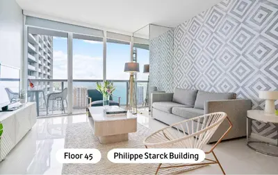 a living room with a couch and a table at MVR - Icon Brickell & King Suite Views in Miami