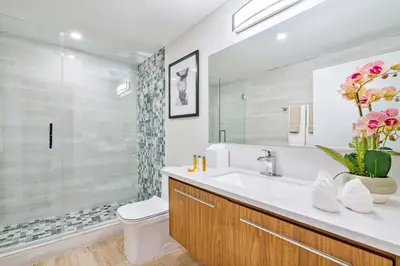 a bathroom with a sink and a toilet and a shower at MVR - Grove-s Best Stay Near Everything You Want in Miami