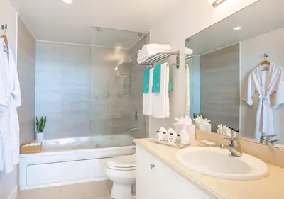 a bathroom with a sink and a toilet and a tub at MVR-Tired of Hotels This Stay Breaks the Mold in Miami